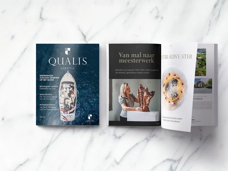 Qualis magazine op tafel
