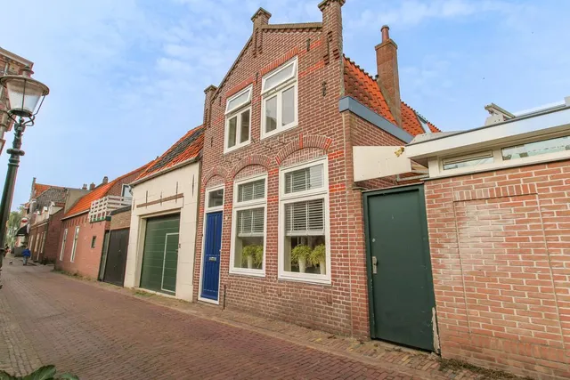 Foto 1 van H J Schimmelstraat 2