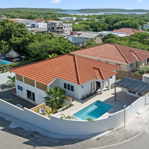 Aerial view of the villa with pool on the corner plot — Kaya Gamay, Curaçao.